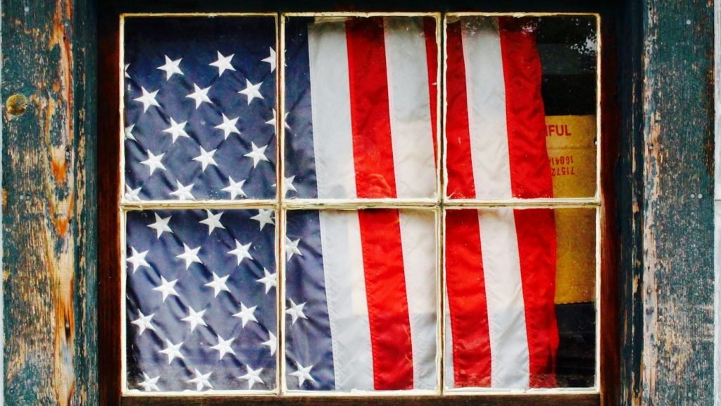 United States of America flag on window pane